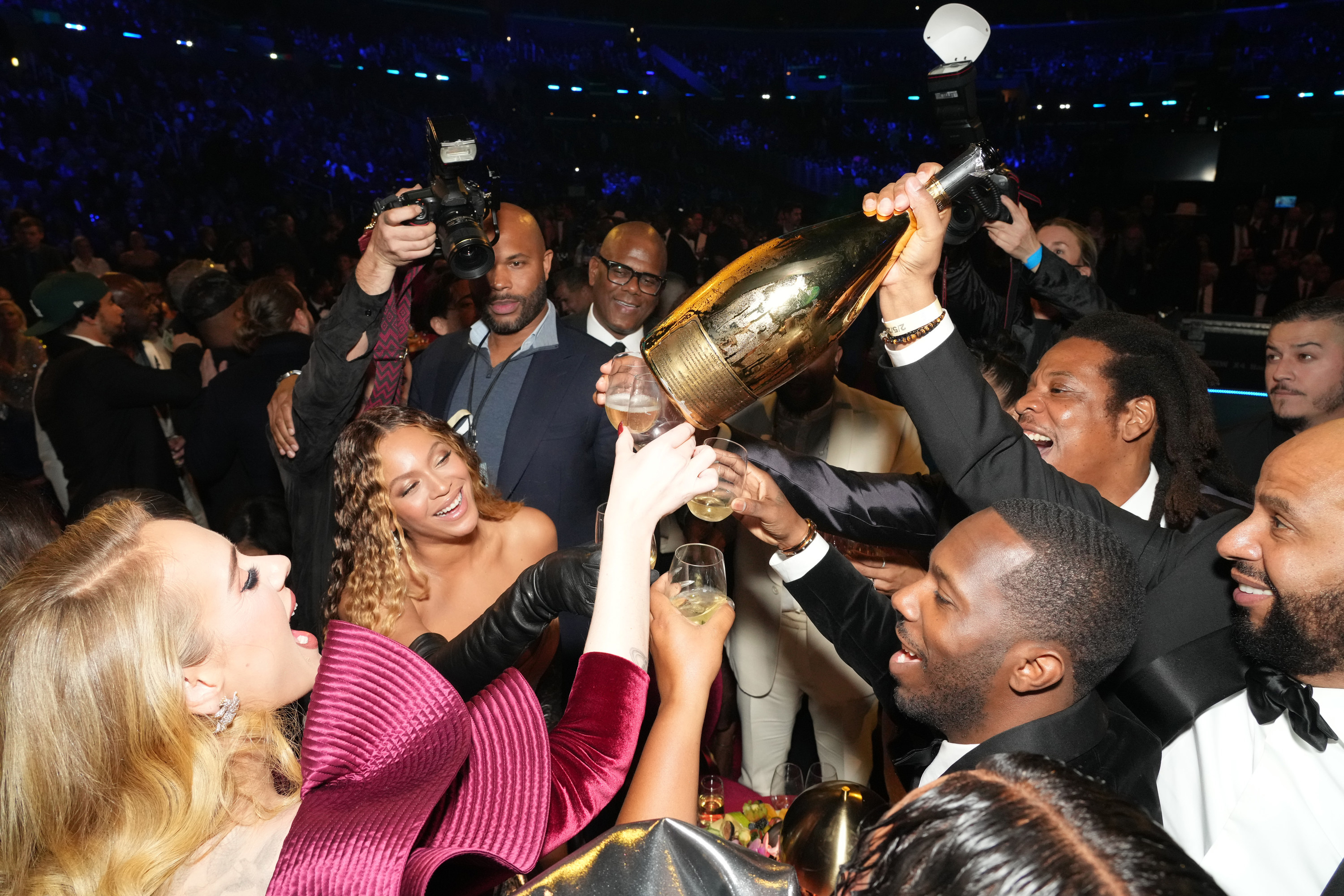 Beyoncé, Adele, Jay-Z and more sharing a toast