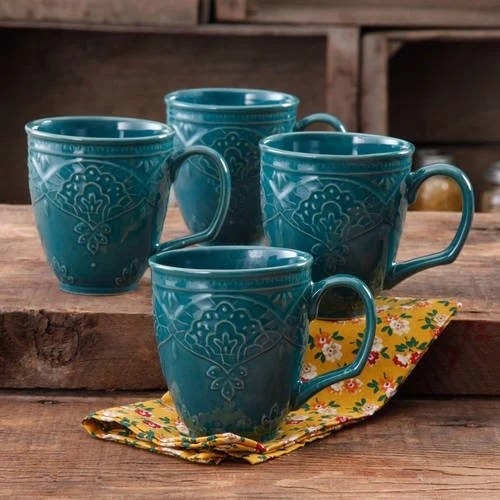 the set of four blue mugs