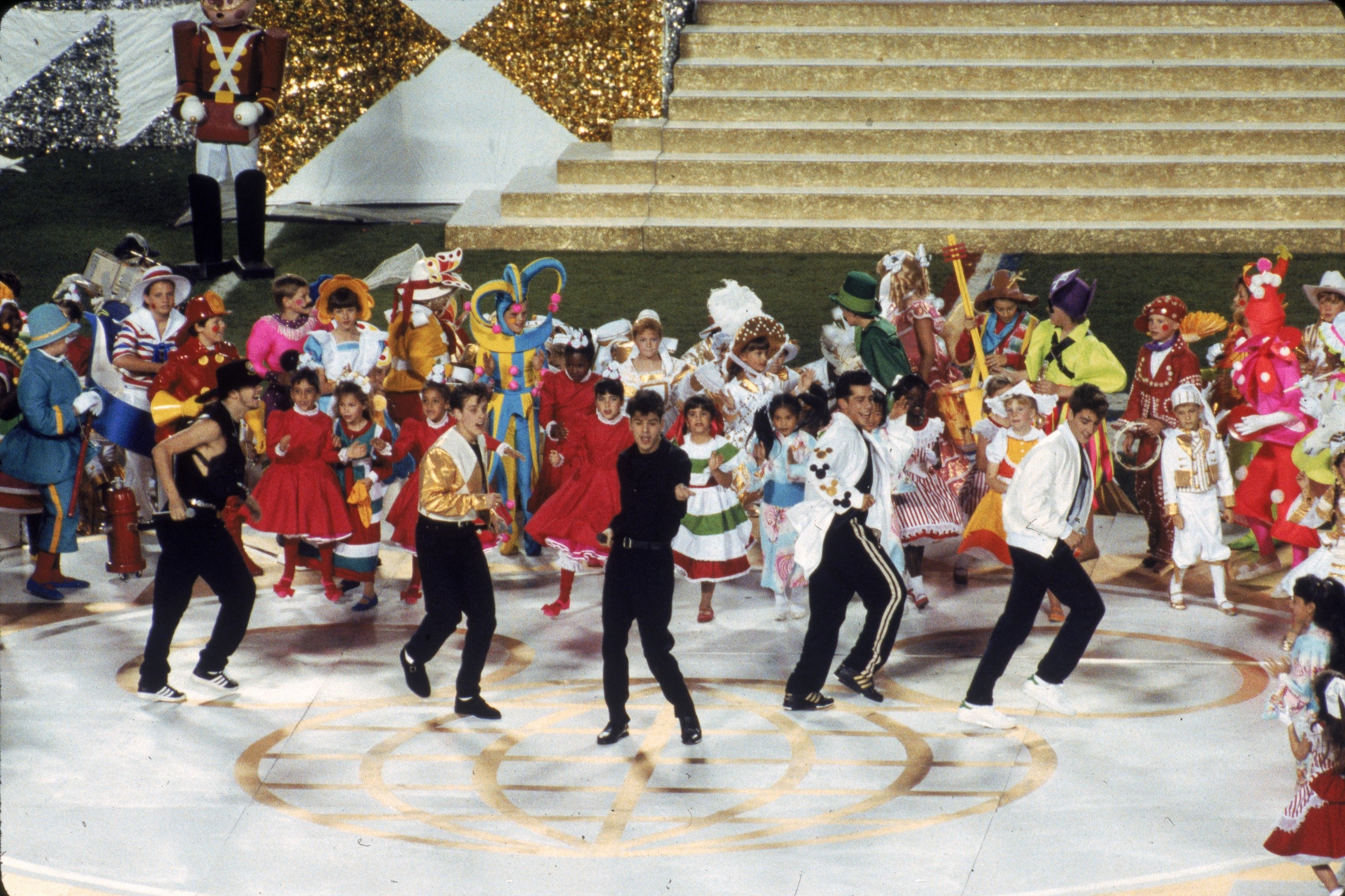 New Kids On The Block perform prior to the New York Giants taking on the Buffalo Bills in Super Bowl XXV