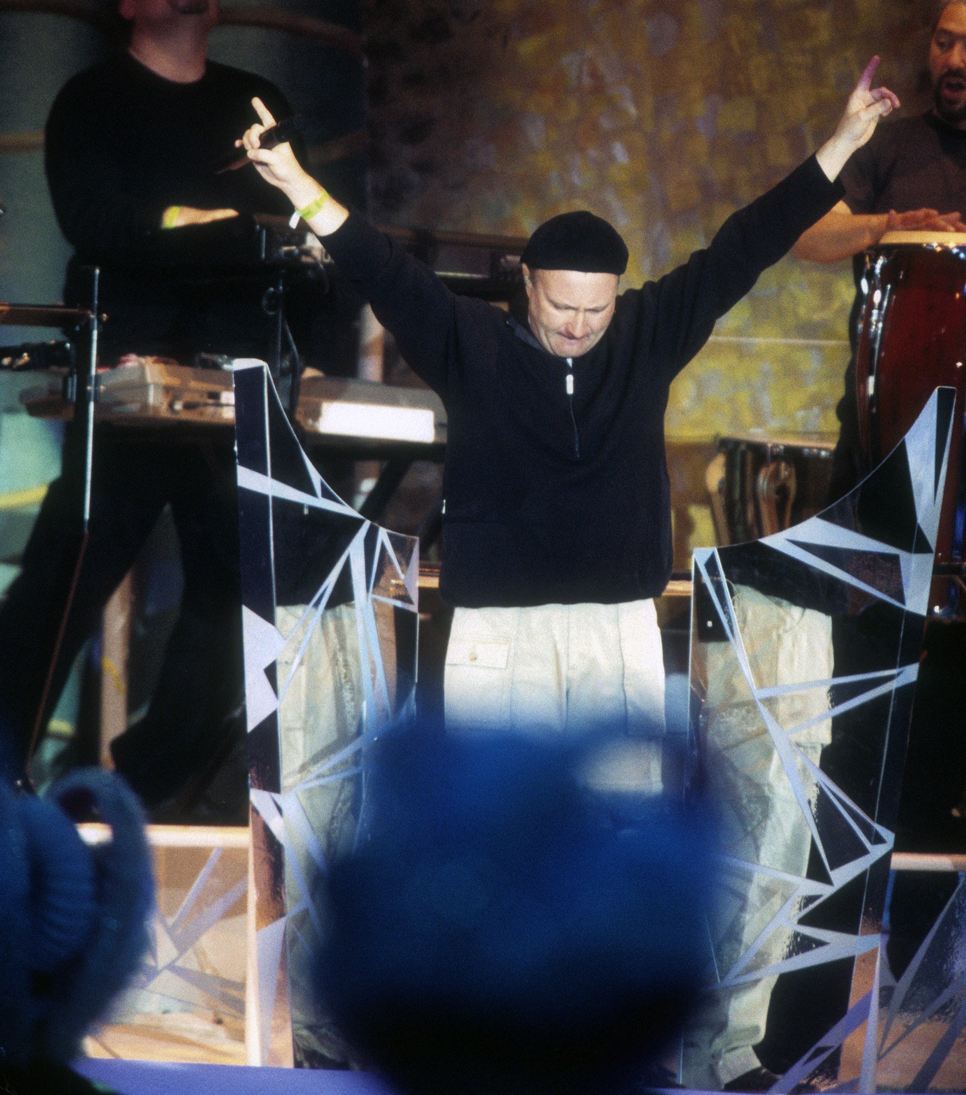 Phil Collins performs during the Super Bowl XXXIV Halftime Show