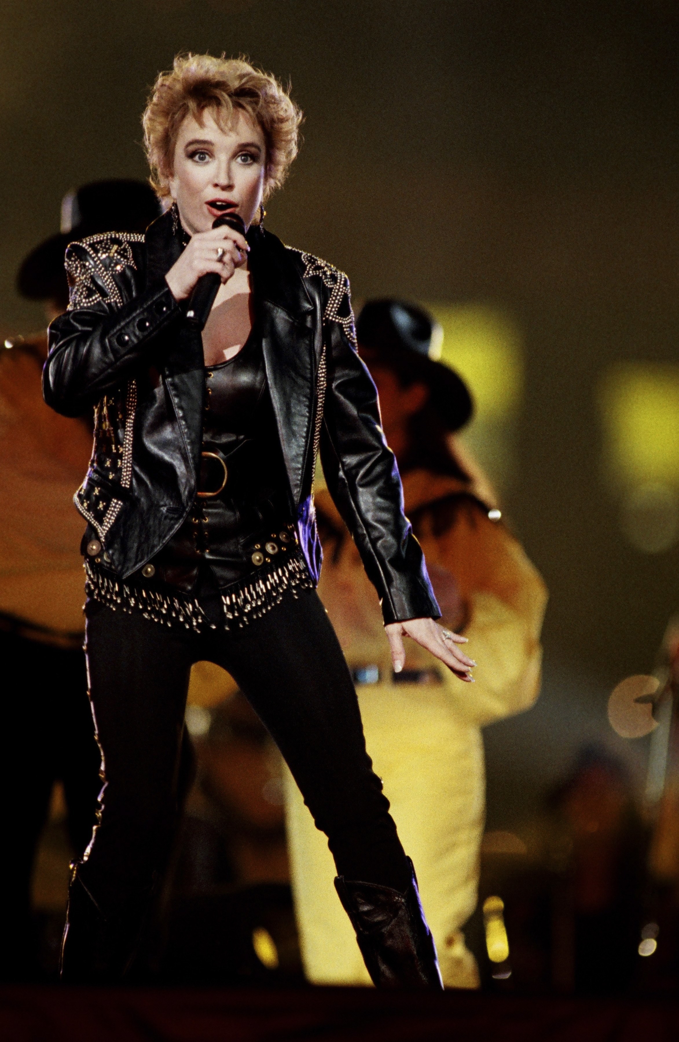 Country singer Tanya Tucker performs during the half-time show at the 1994 Atlanta, Georgia, Superbowl XXVII