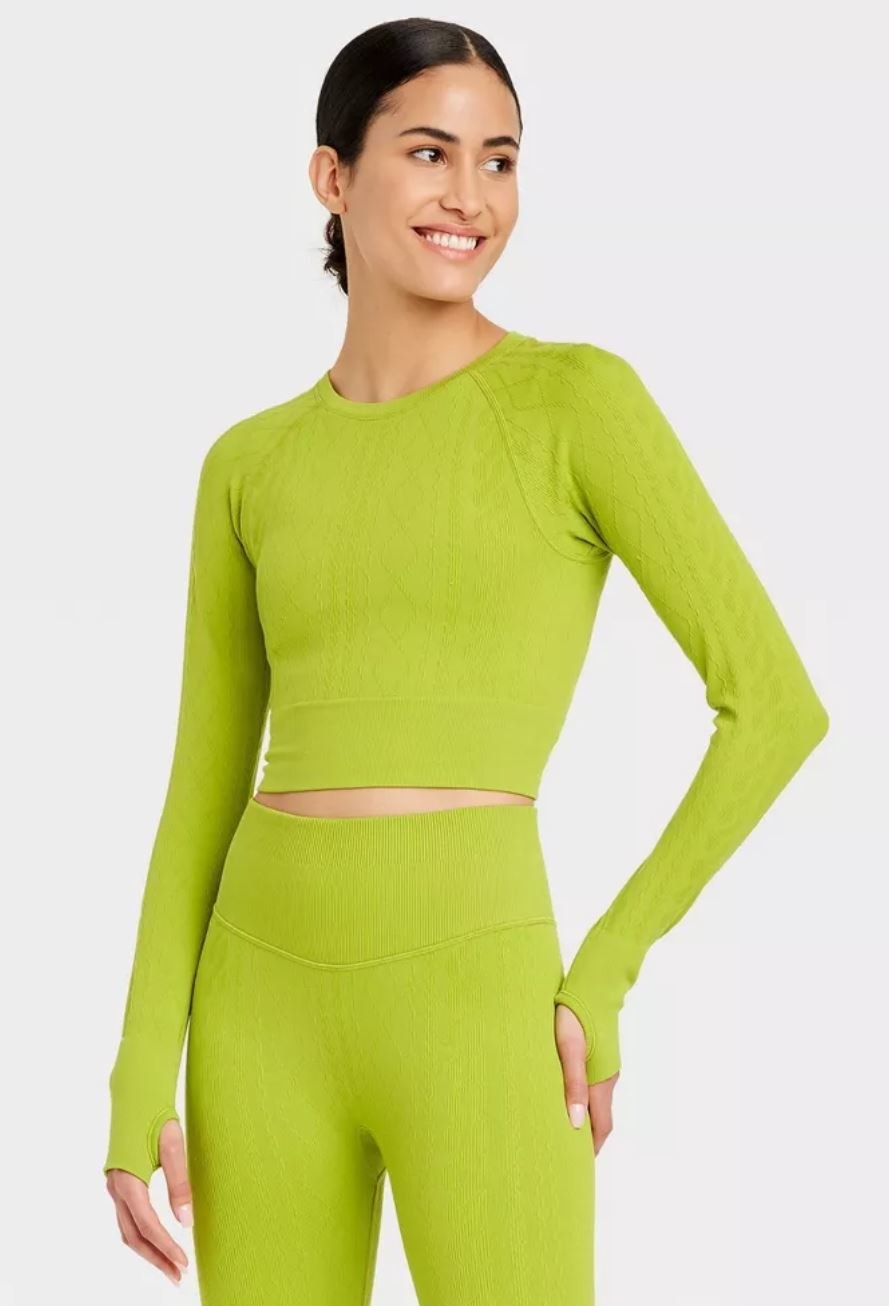 model wearing lime green workout long sleeve