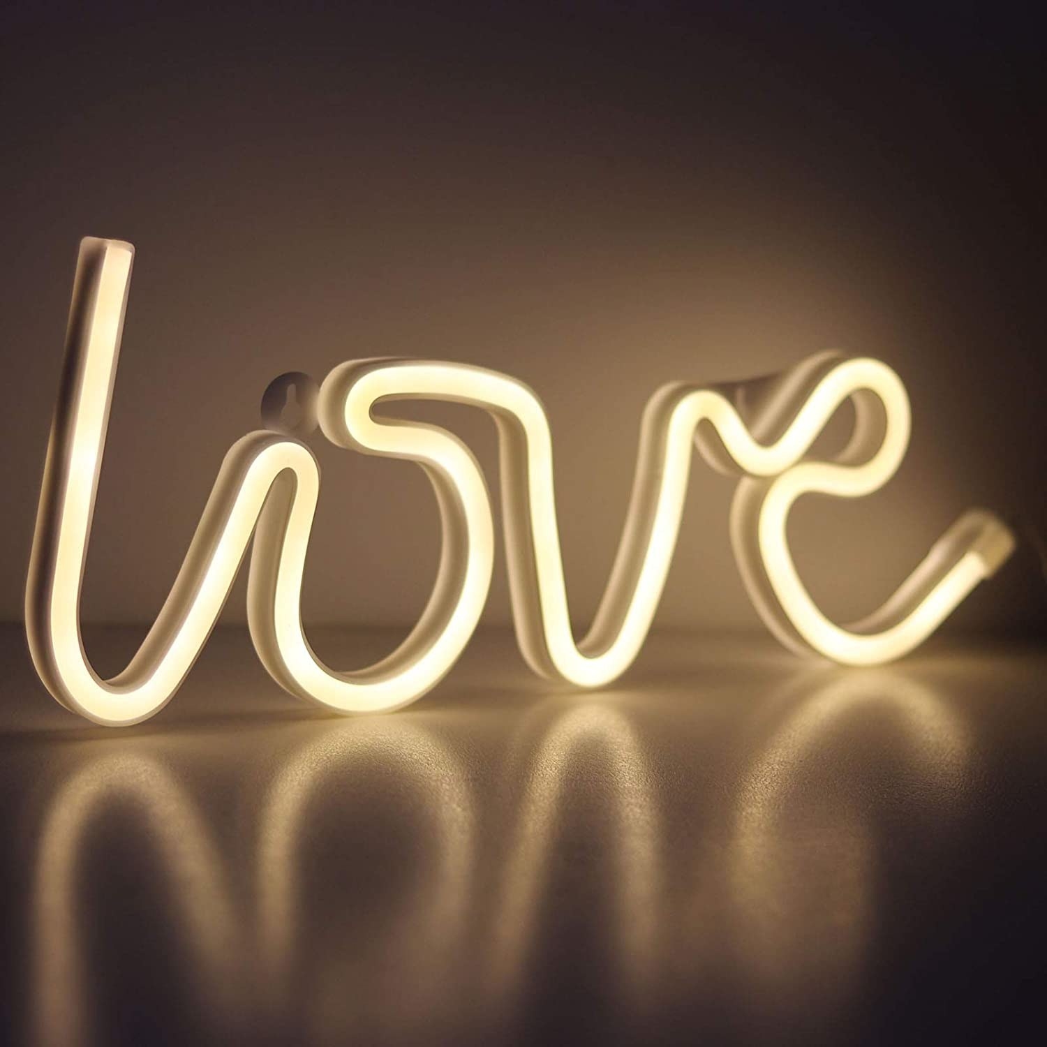an LED light that spells out love