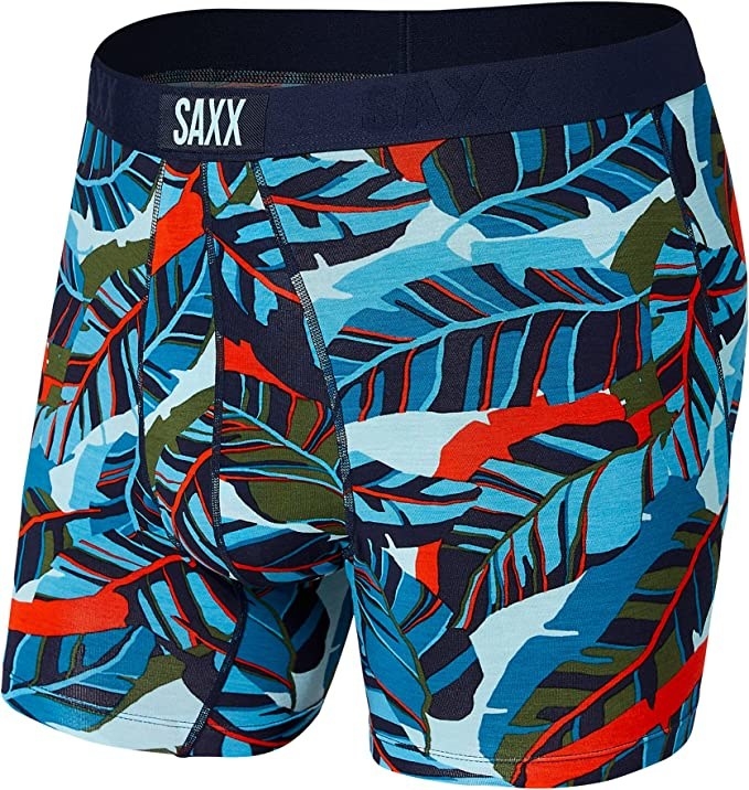 a pair of boxers with a vibrant leafy pattern