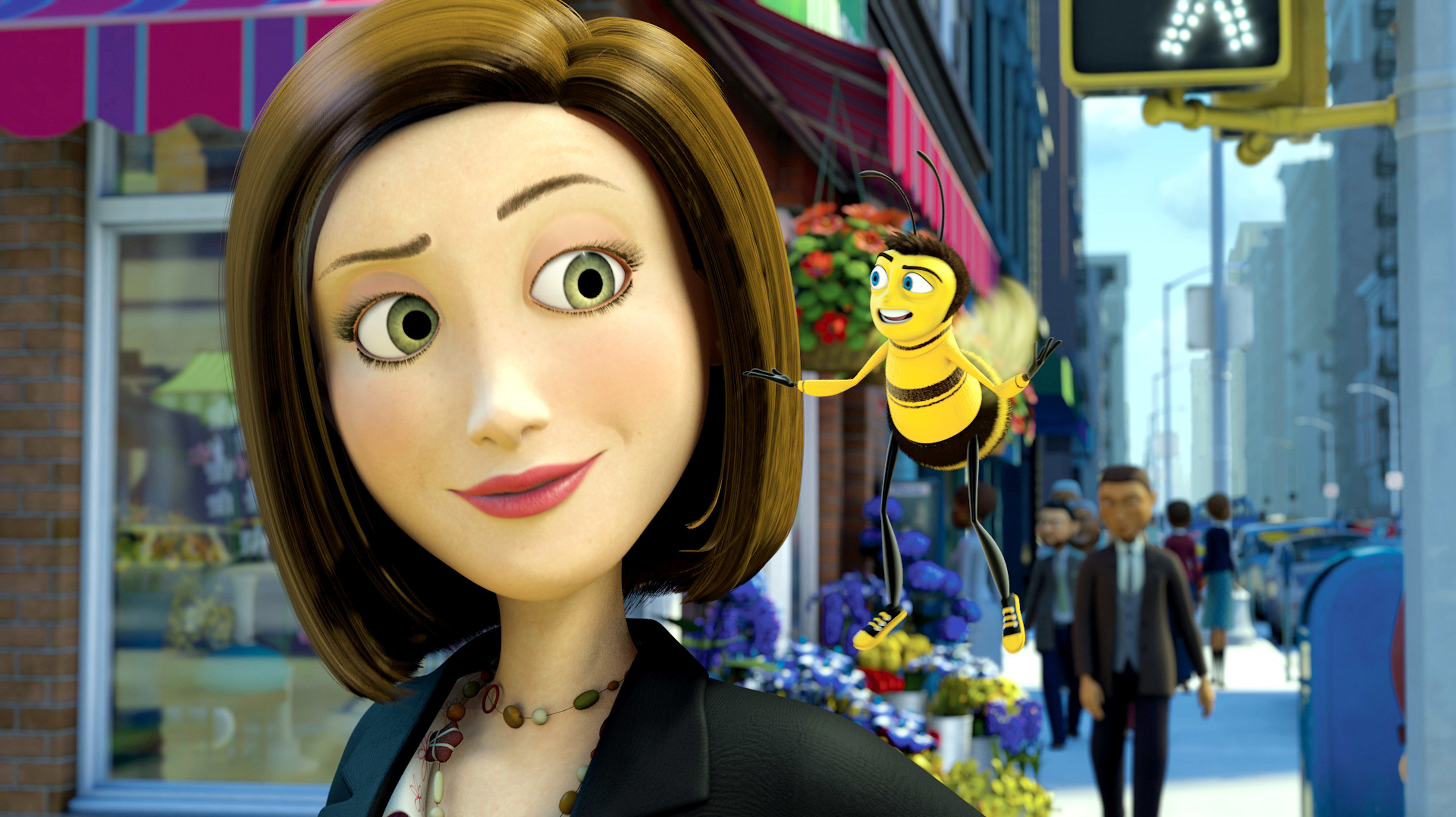 A woman talks to a bee