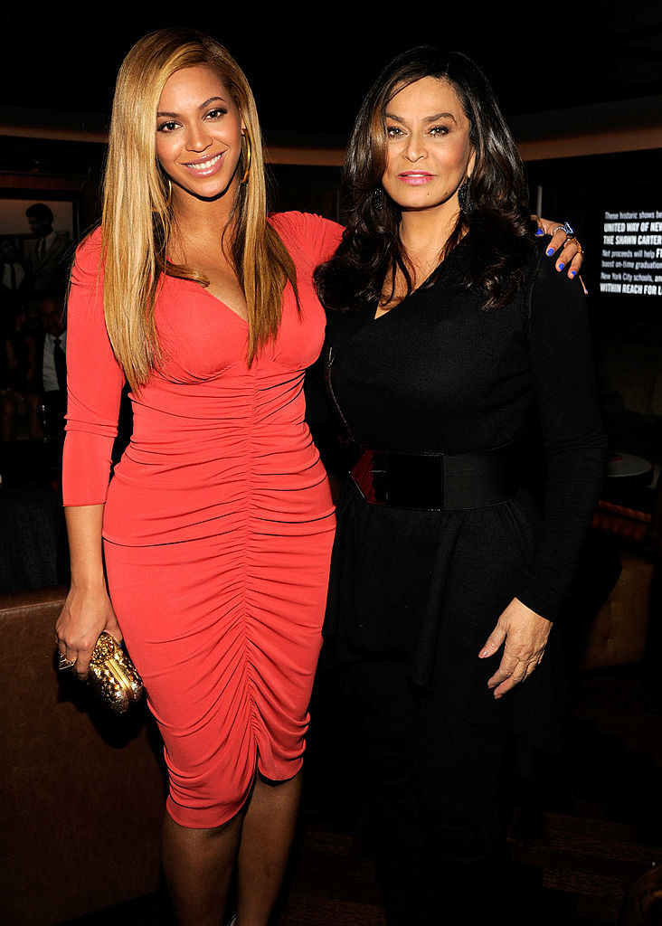 Beyoncé with her arm around Tina