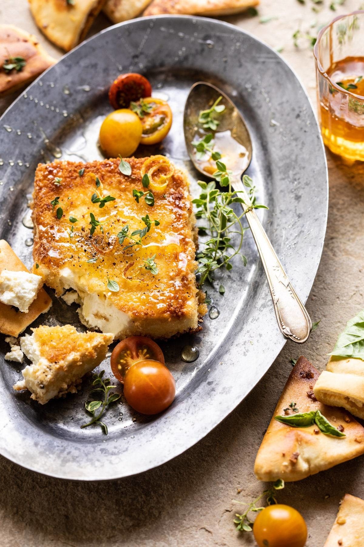Pan-Fried Feta With Peppered Honey on a plate