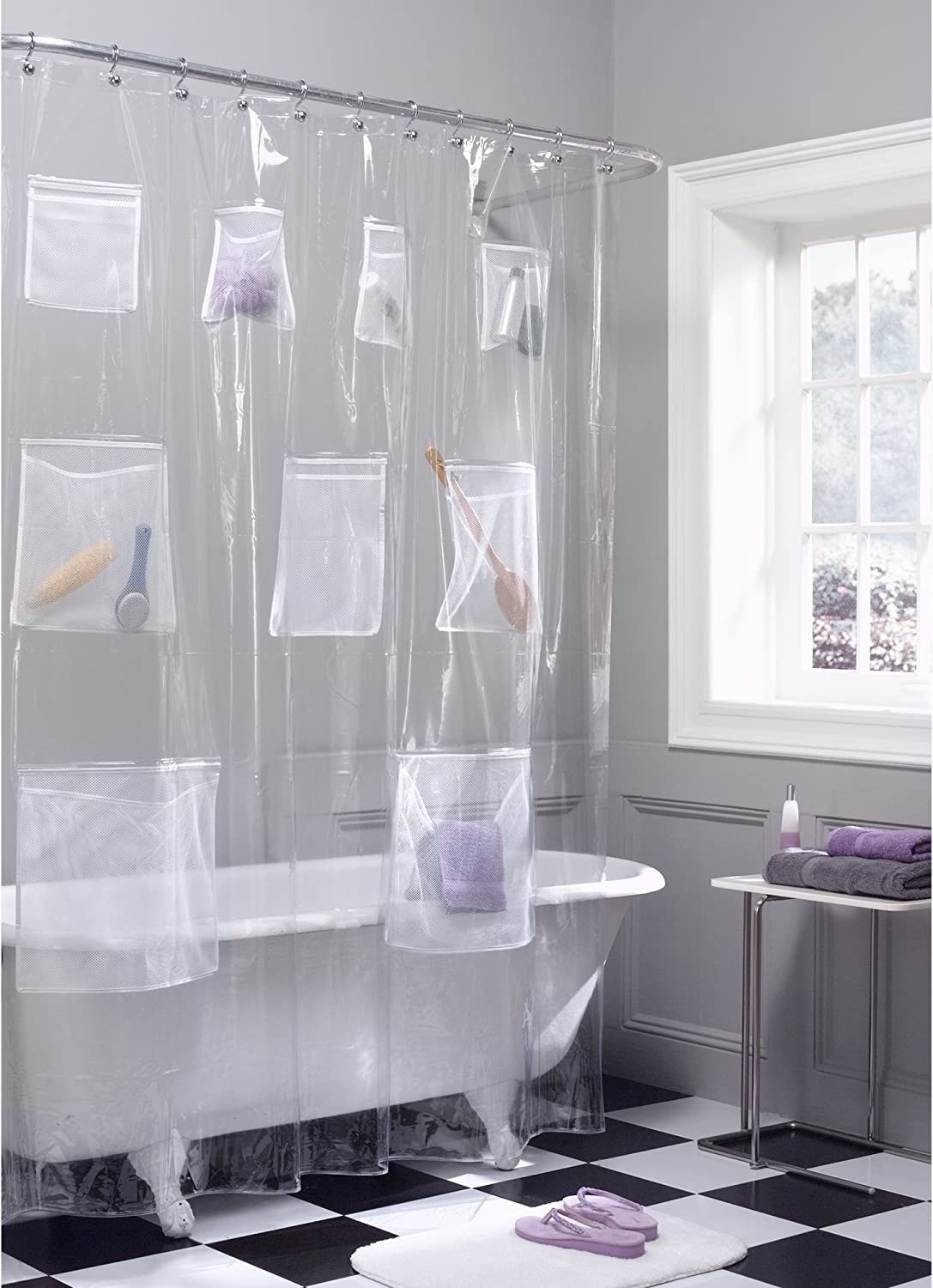 the transparent shower liner with products in the pockets