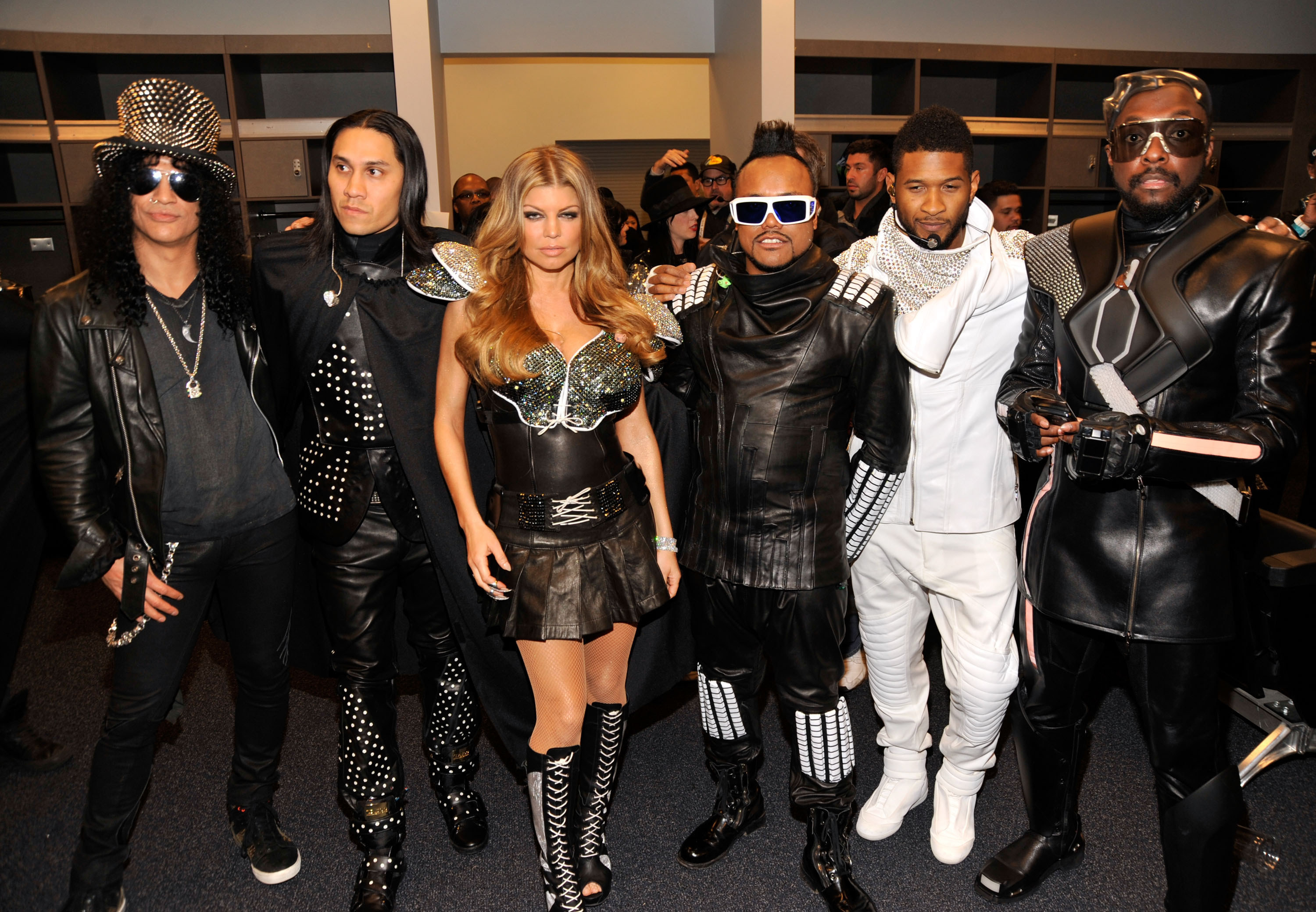 Slash and Taboo, Fergie and apl.de.ap of The Black Eyed Peas, Usher and will.i.am of The Black Eyed Peas attend the Bridgestone Super Bowl XLV Halftime Show