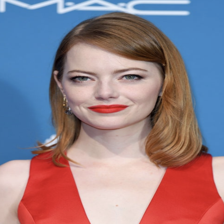 Emma in red on the red carpet