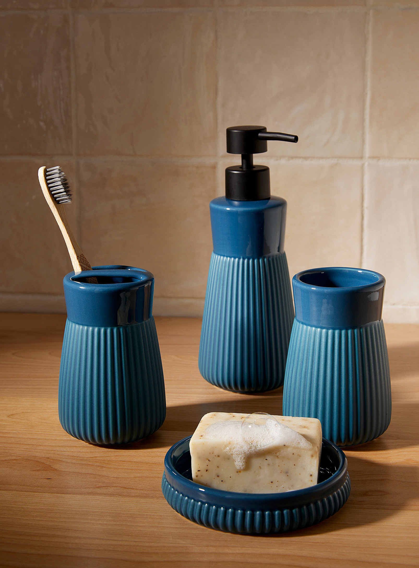 a set of matching bathroom accessories