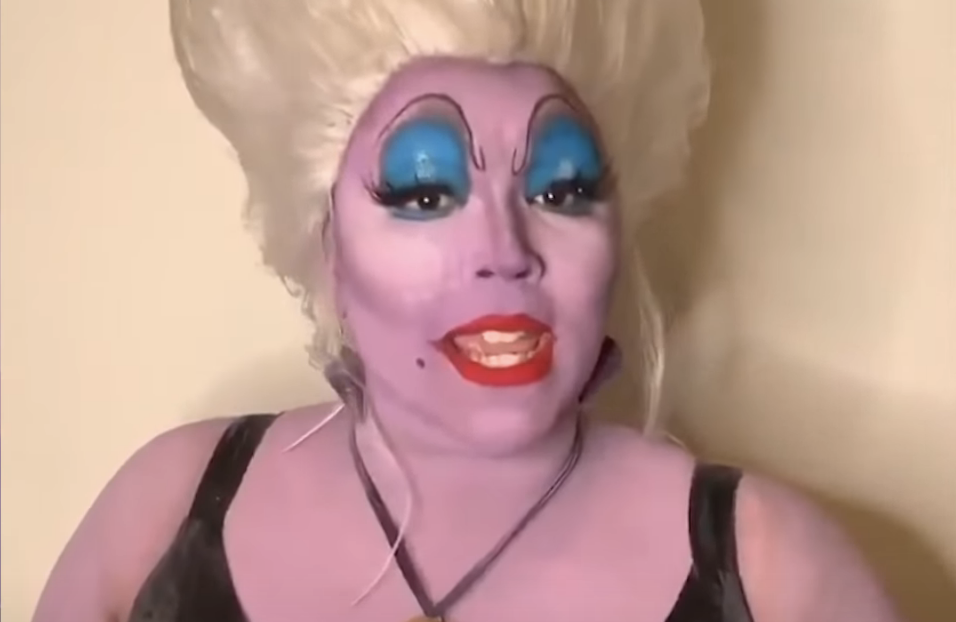 Lizzo in Ursula face makeup and wig