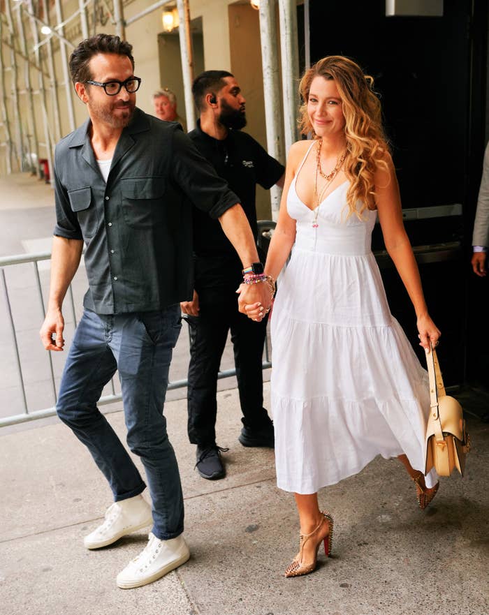 Blake Lively and Ryan Reynolds walking outside
