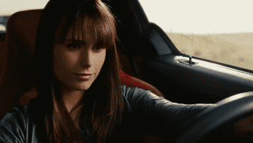 Jordana Brewster as Mia in Fast &amp;amp; Furious drive a car