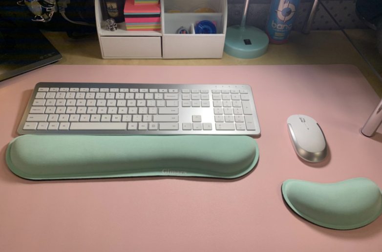 reviewer&#x27;s memory gel pads in front of their keyboard and mouse