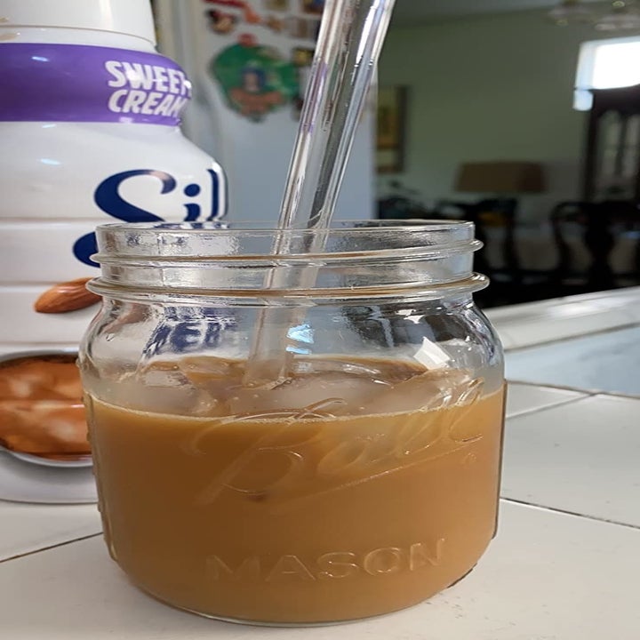 reviewer's iced coffee in mason jar
