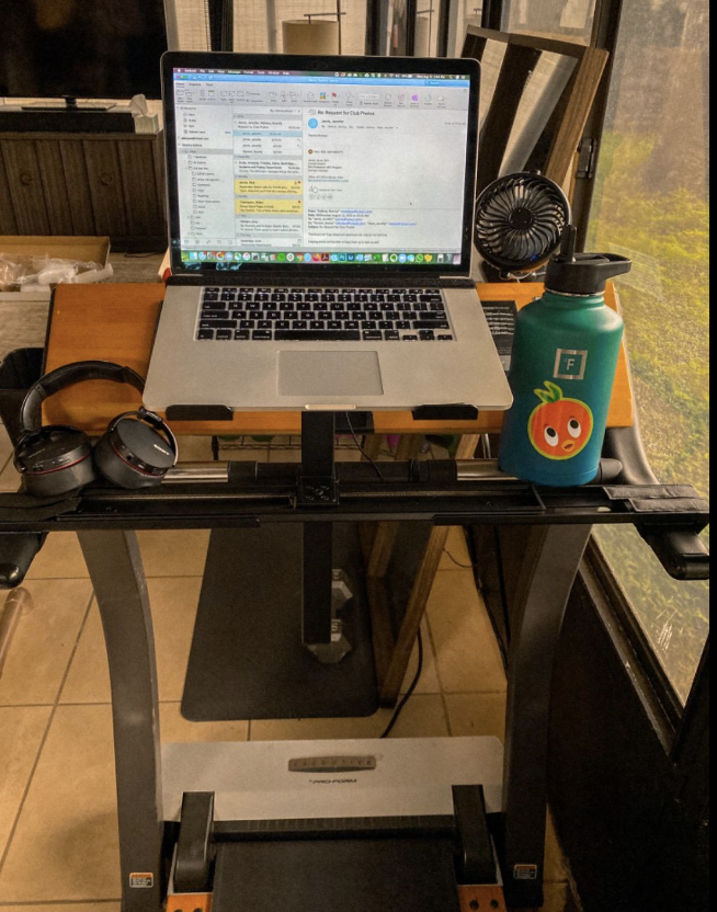 reviewer's laptop on adjustable bar