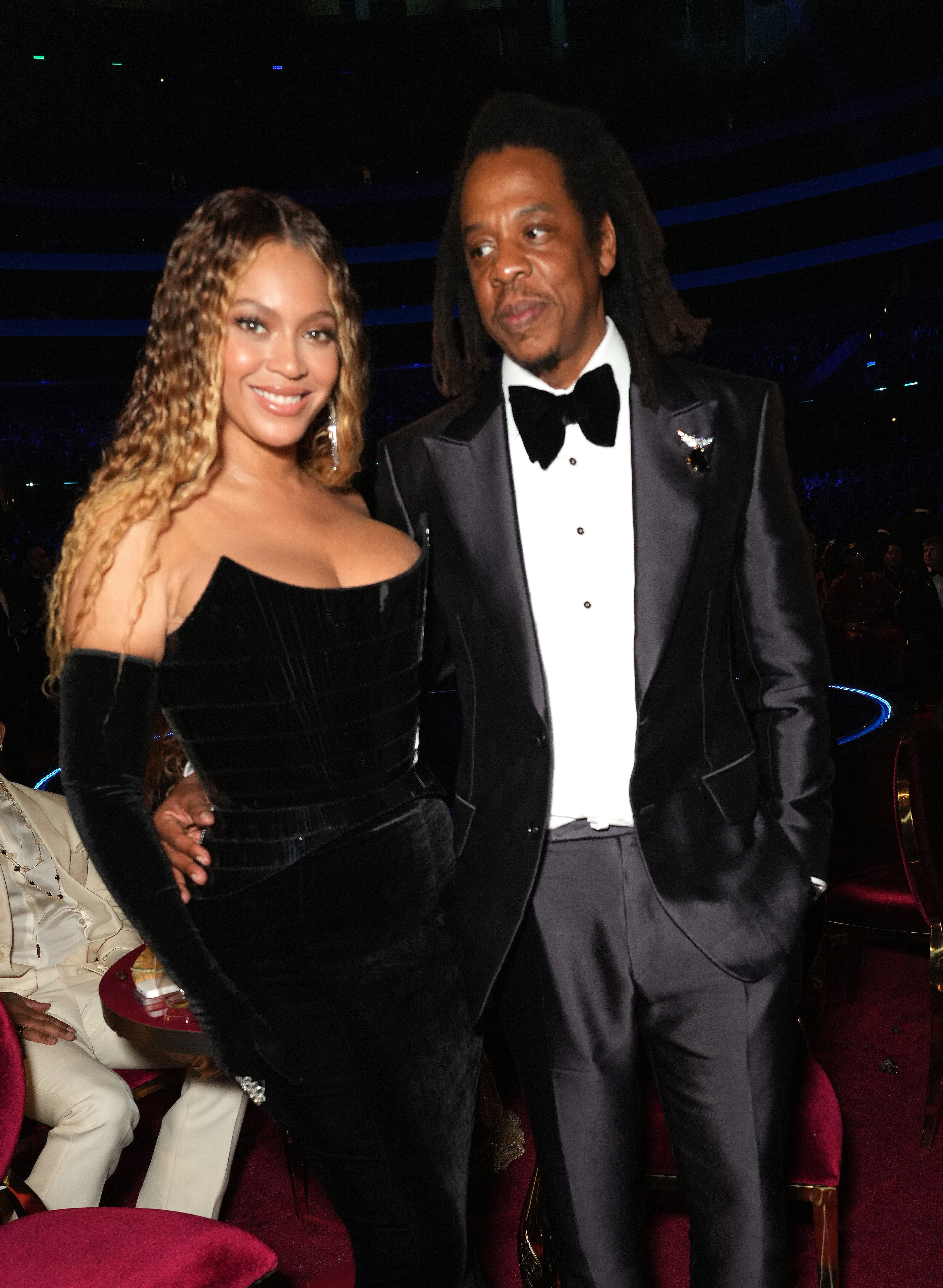 Jay-z looking at Beyonce while at an event
