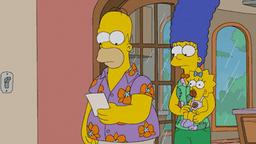 Homer, Marge and Maggie in The Simpsons wearing Hawaiian shirts