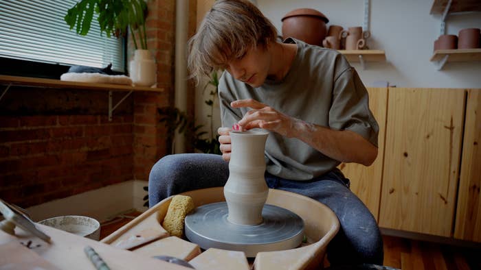 Adam Blythe doing pottery