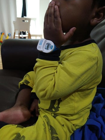 A child wearing the watch in blue