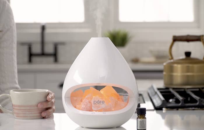 the diffuser salt lamp device on a counter