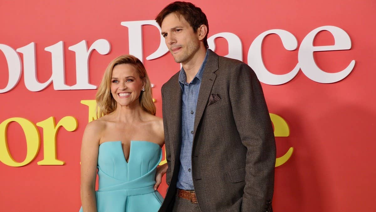 During a recent appearance on 'Chicks in the Office,' Kutcher addressed the awkward photos between him and 'Your Place or Mine' co-star Reese Witherspoon.