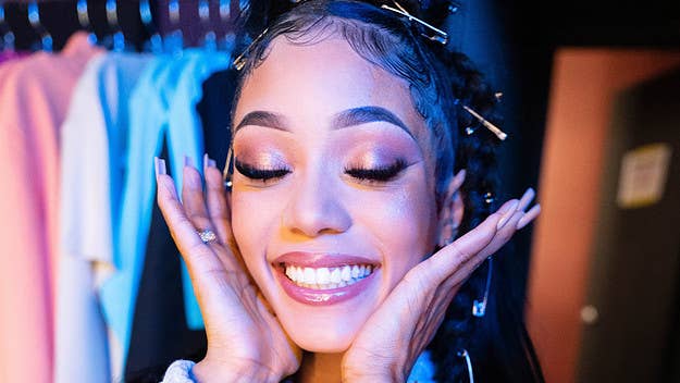 Coi Leray is the face of SNIPES' newest collection. She posted a video on Instagram announcing the partnership, modeling the flashy new apparel.