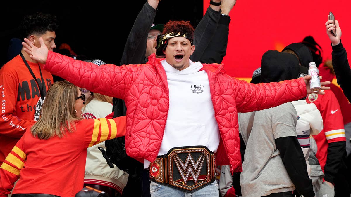Patrick Mahomes was seen chugging beers while wearing goggles and a Chiefs-themed WWE championship belt during the team's Super Bowl LVII victory parade.