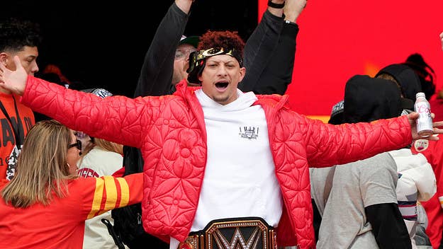 Patrick Mahomes was seen chugging beers while wearing goggles and a Chiefs-themed WWE championship belt during the team's Super Bowl LVII victory parade.