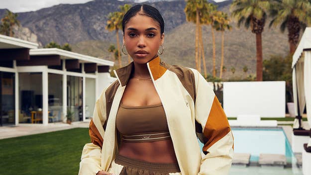 The 26-year-old model and entrepreneur is photographed poolside in sunny Palm Springs, California, modeling Kith’s luxurious new Spring 2023 pieces.