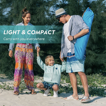 A model holding the collapsed tent in its case over their shoulder