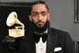 Nipsey Hussle is seen at a Grammys event