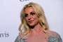 Singer Britney Spears walks the red carpet at the 2017 Pre-GRAMMY Gala
