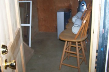 This photo shows the “basement dungeon cell” Olivia Atkocaitis was imprisoned inside when it was photographed by New Boston police in 2011  Read more at: https://www.miamiherald.com/news/nation-world/national/article272018092.html#storylink=cpy