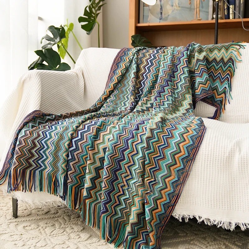 The striped throw blanket on a couch