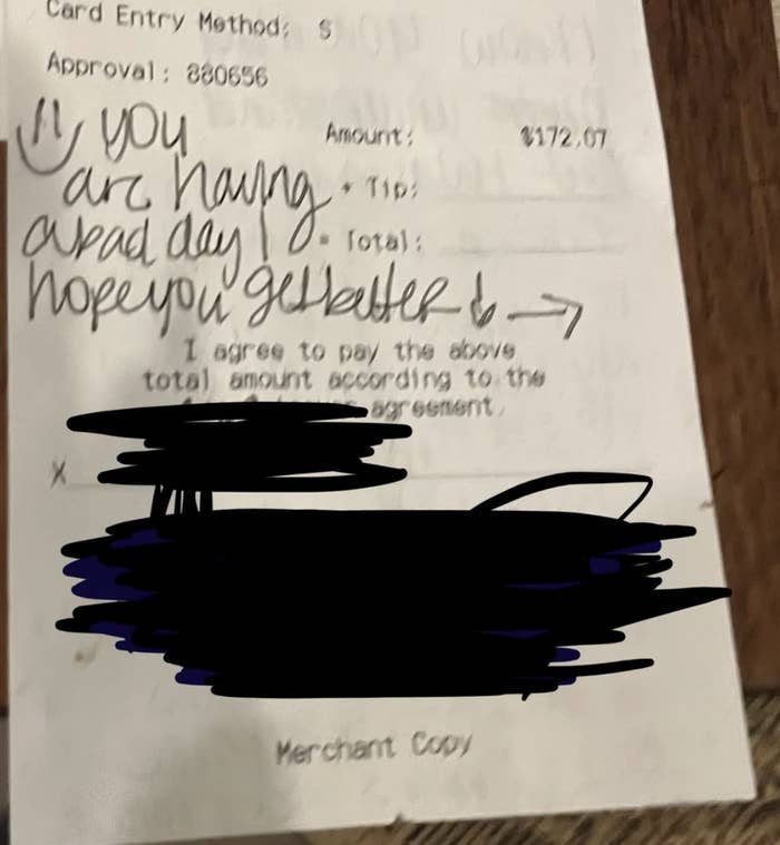 &quot;You are having a bad day! Hope you get better!&quot; written with a smiley emoji on a restaurant bill instead of a tip