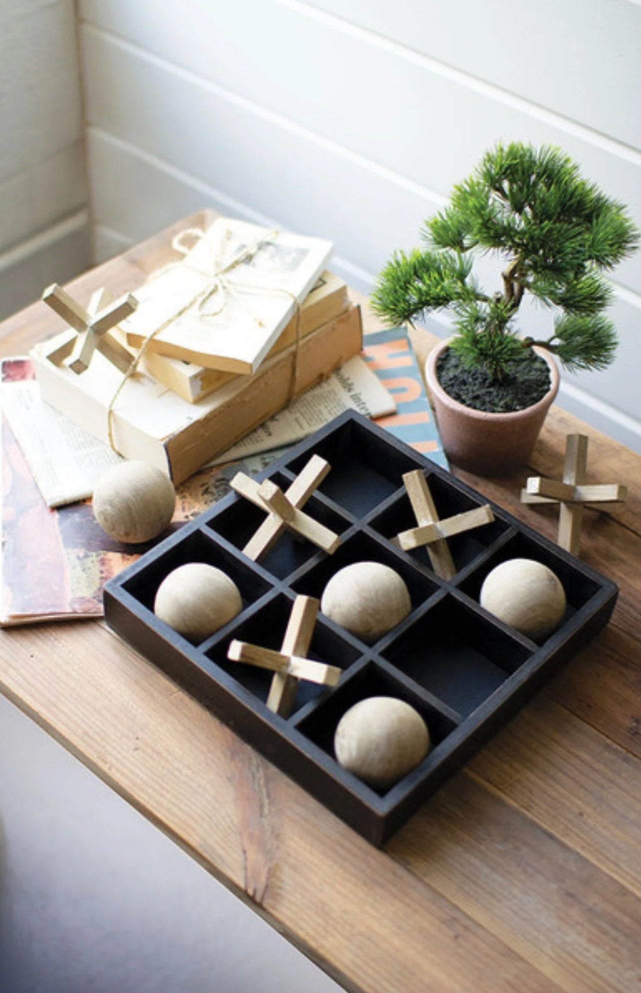 The tic-tac-toe- set on a table