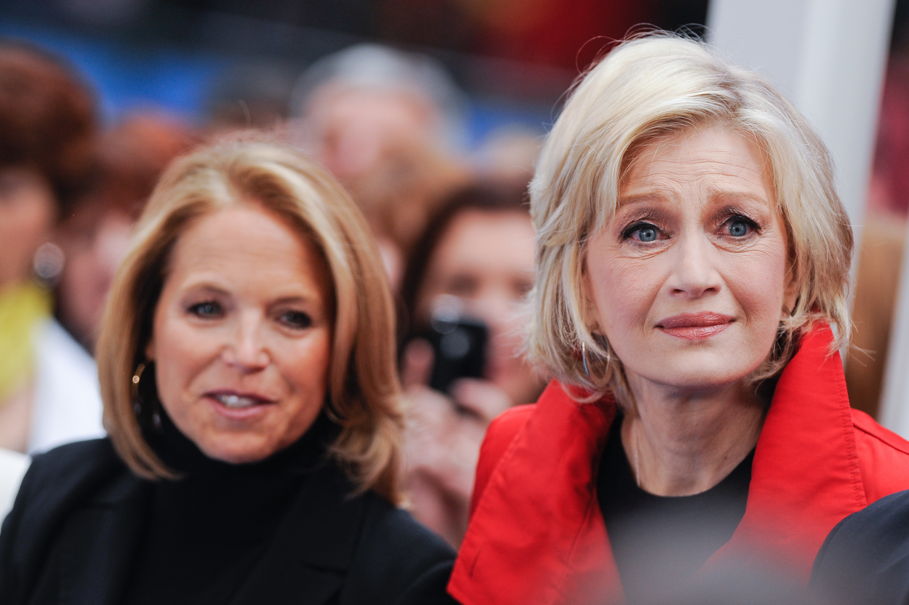 News reporters Katie Couric (L) and Diane Sawyer tape an interview at &quot;Good Morning America&quot; at the ABC Times Square Studios on October 3, 2011