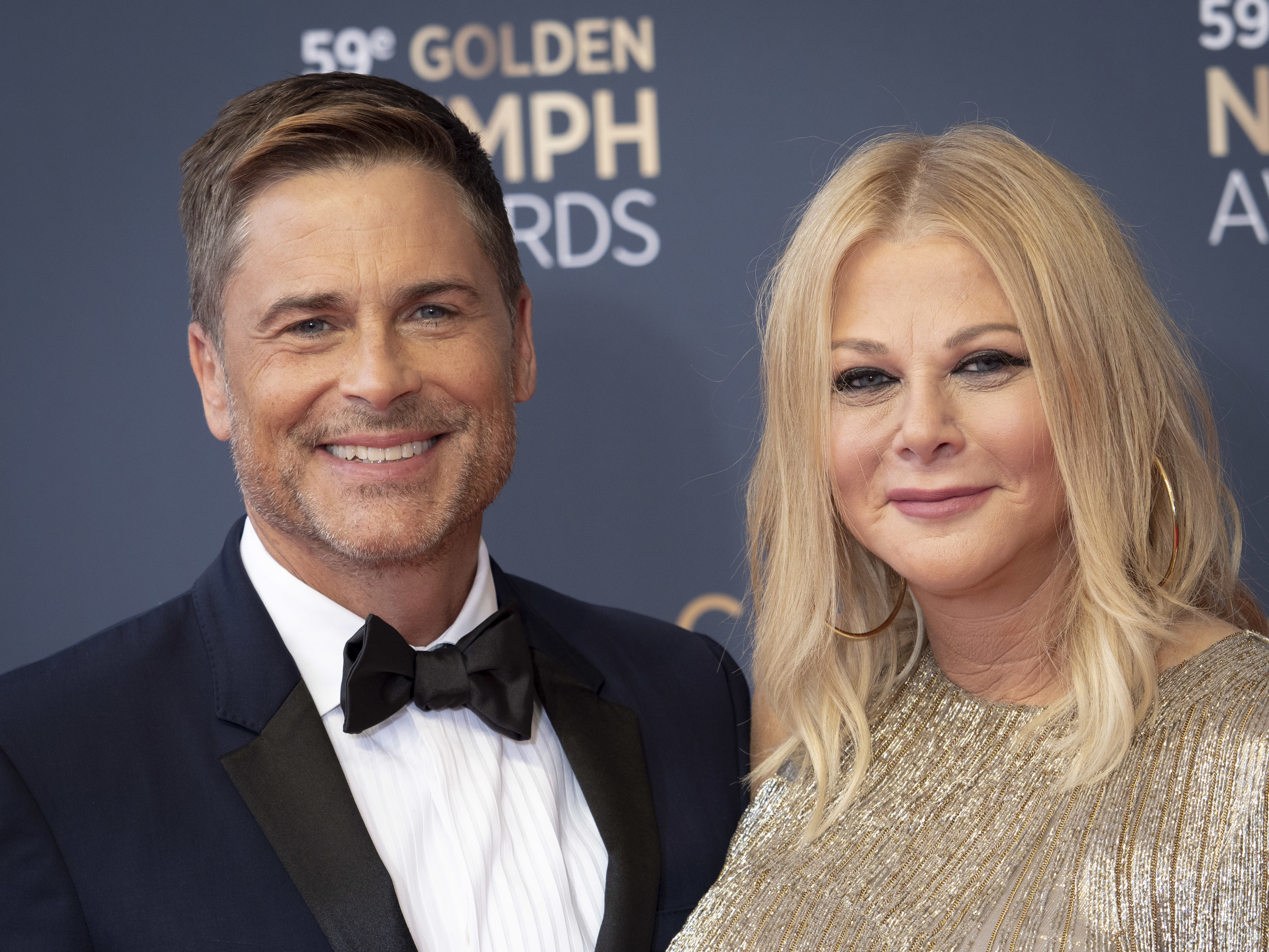Rob Lowe and Sheryl Berkoff on the red carpet