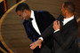 Will Smith is seen slapping Chris Rock at the Academy Awards