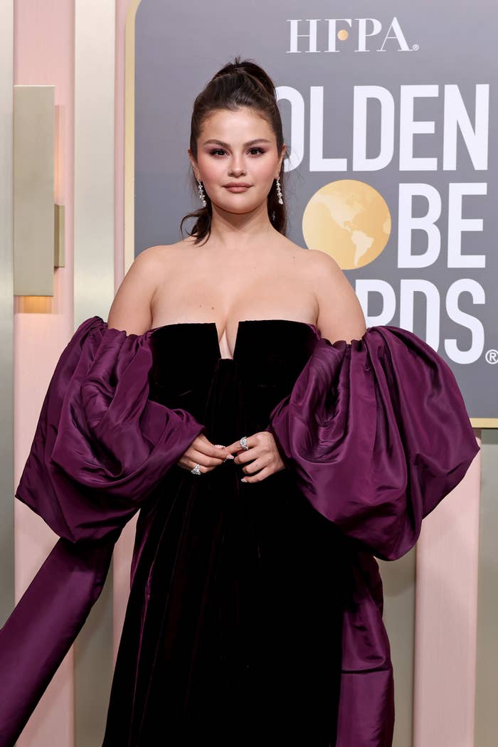 Close-up of Selena in an off-the-shoulder velvet gown