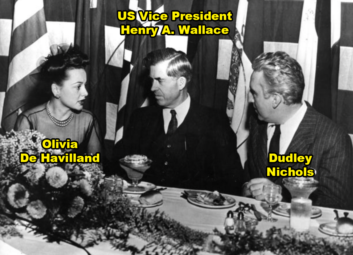 Dudley Nichols at a dinner with Olivia De Havilland and Henry Wallace