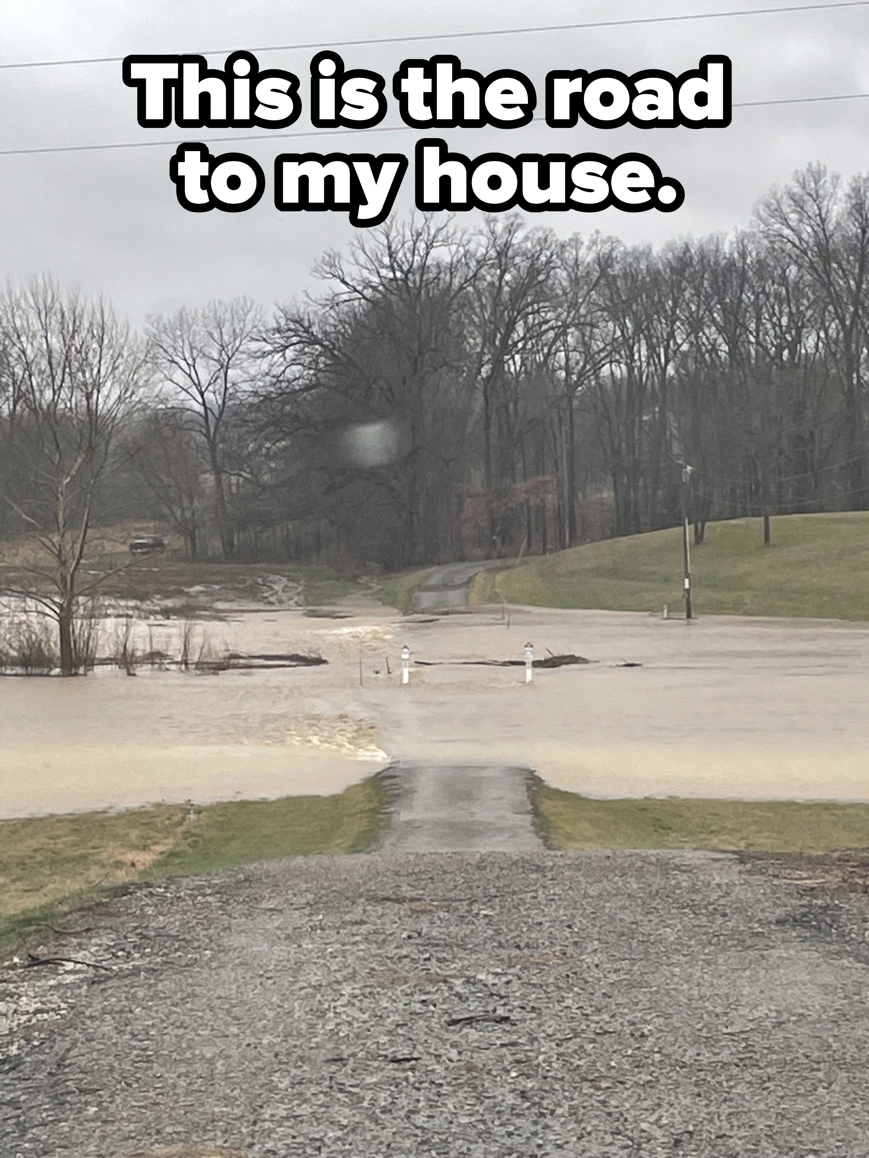 river running through a road to someone&#x27;s house