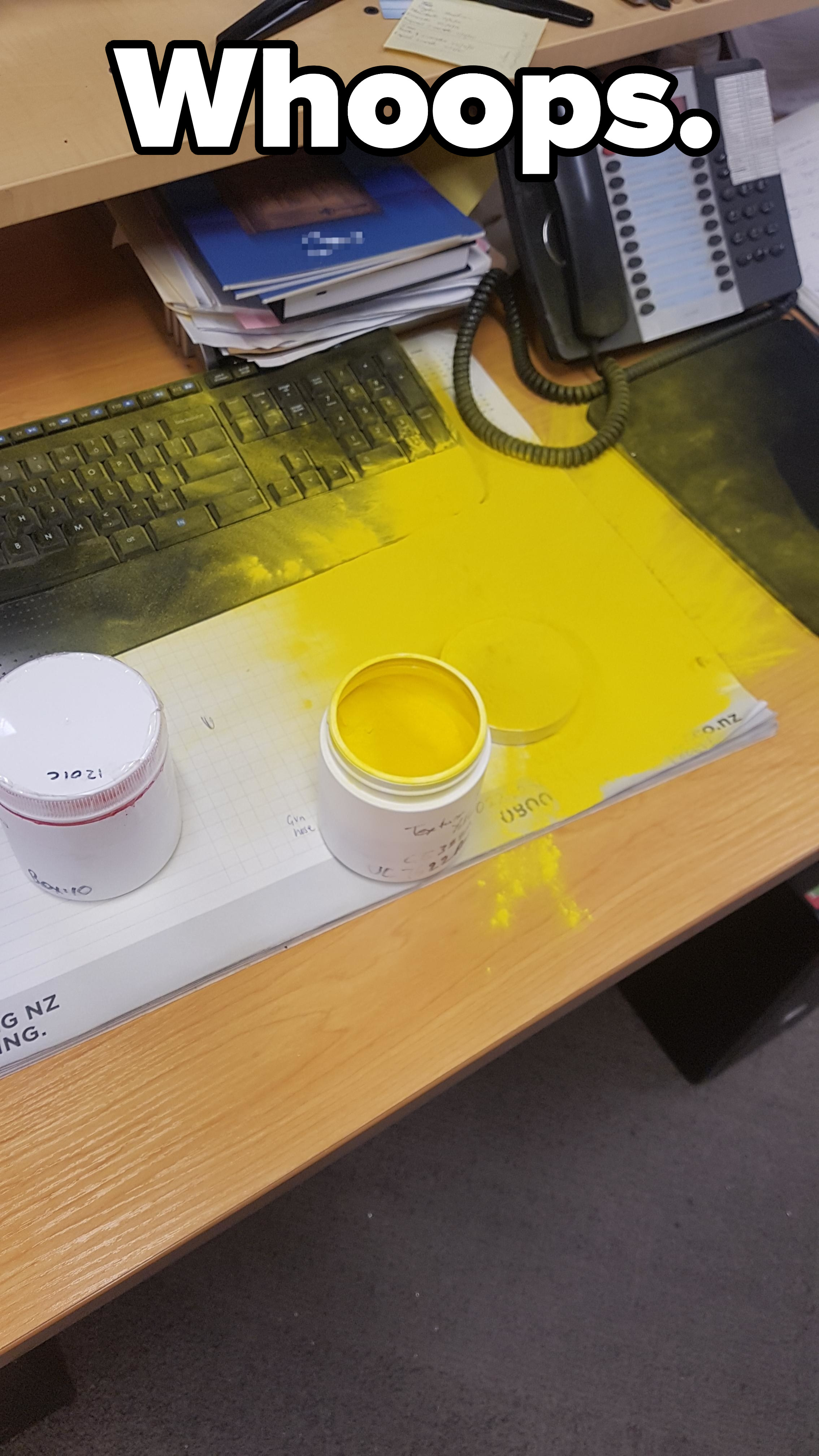 yellow powder spilled all over a desk