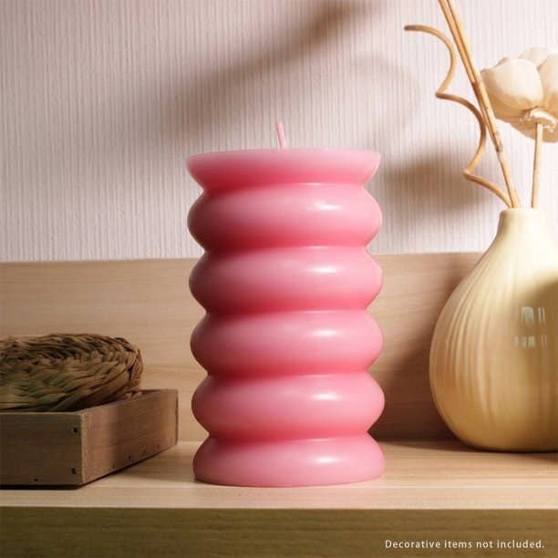 the bubble candle in pink on display on someones shelf