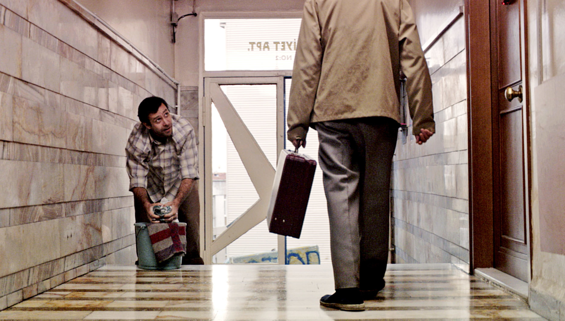 A man scrubbing floors