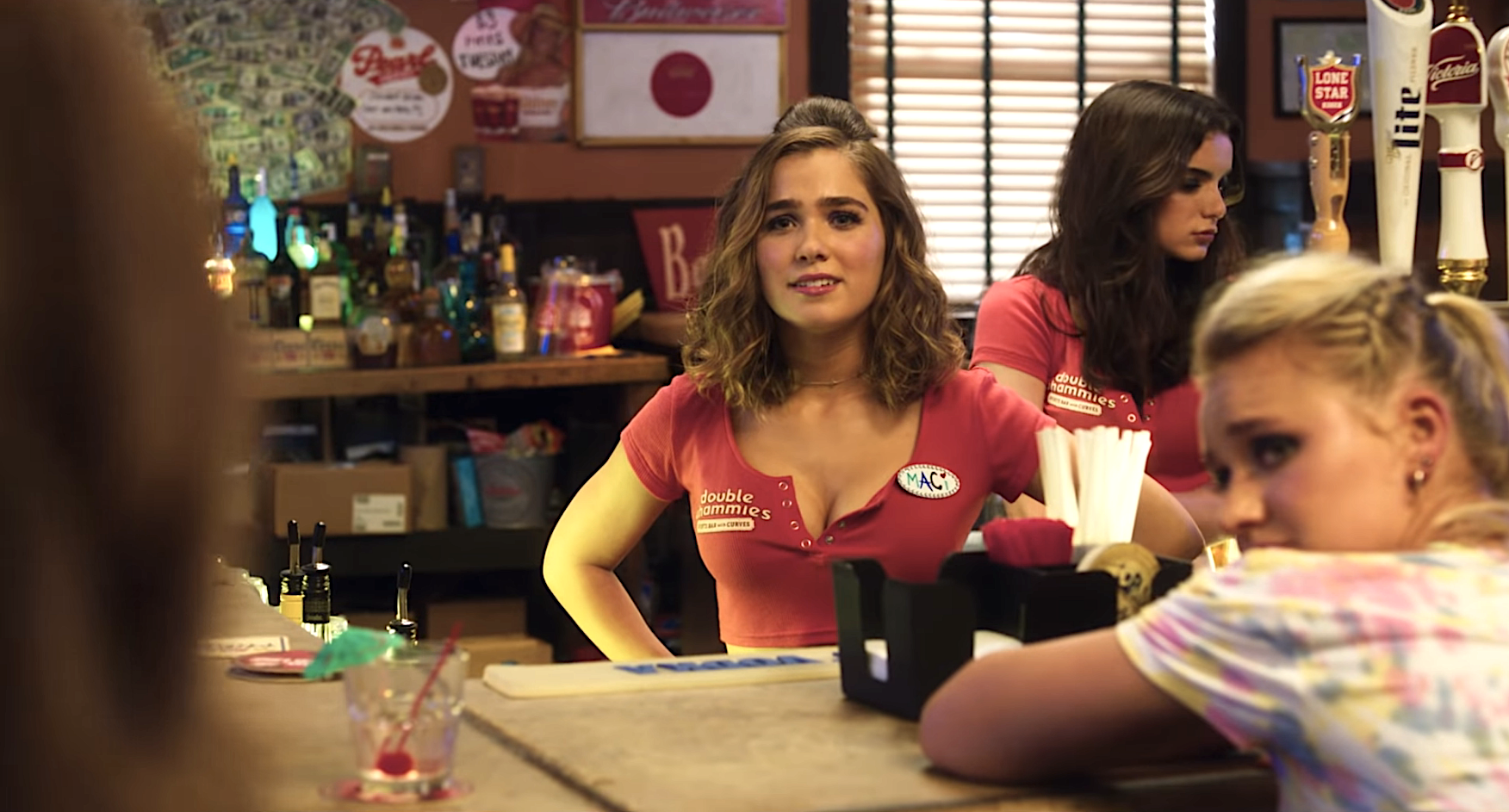 A woman working in a sports bar