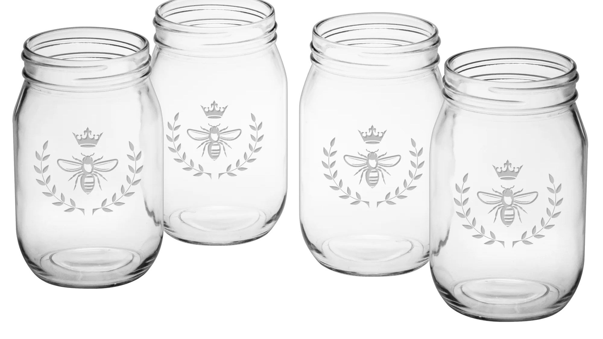 four glass mason jars with a print of a bumblebee with a crown and leaves