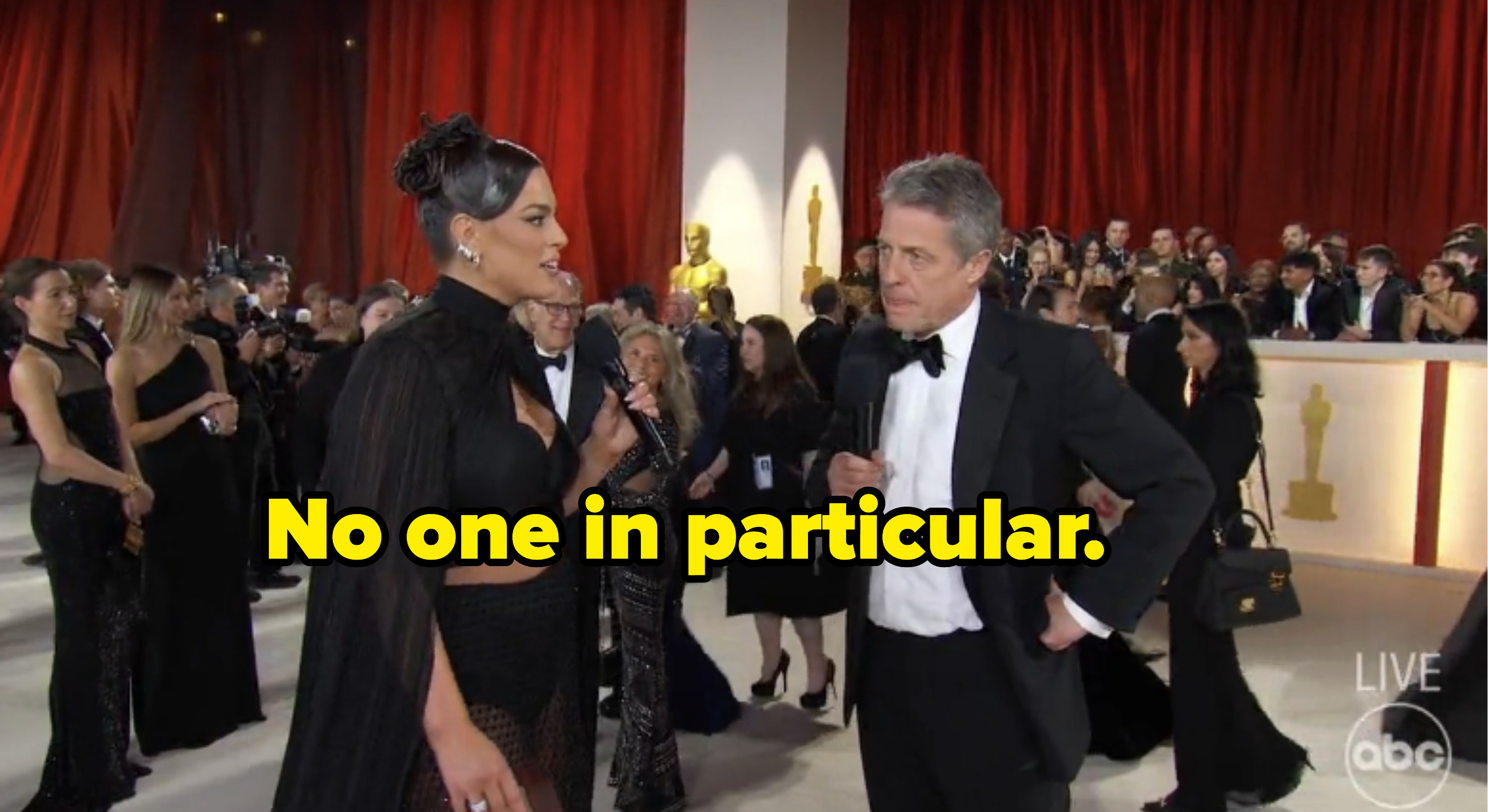 Ashley Graham interviewing Hugh Grant